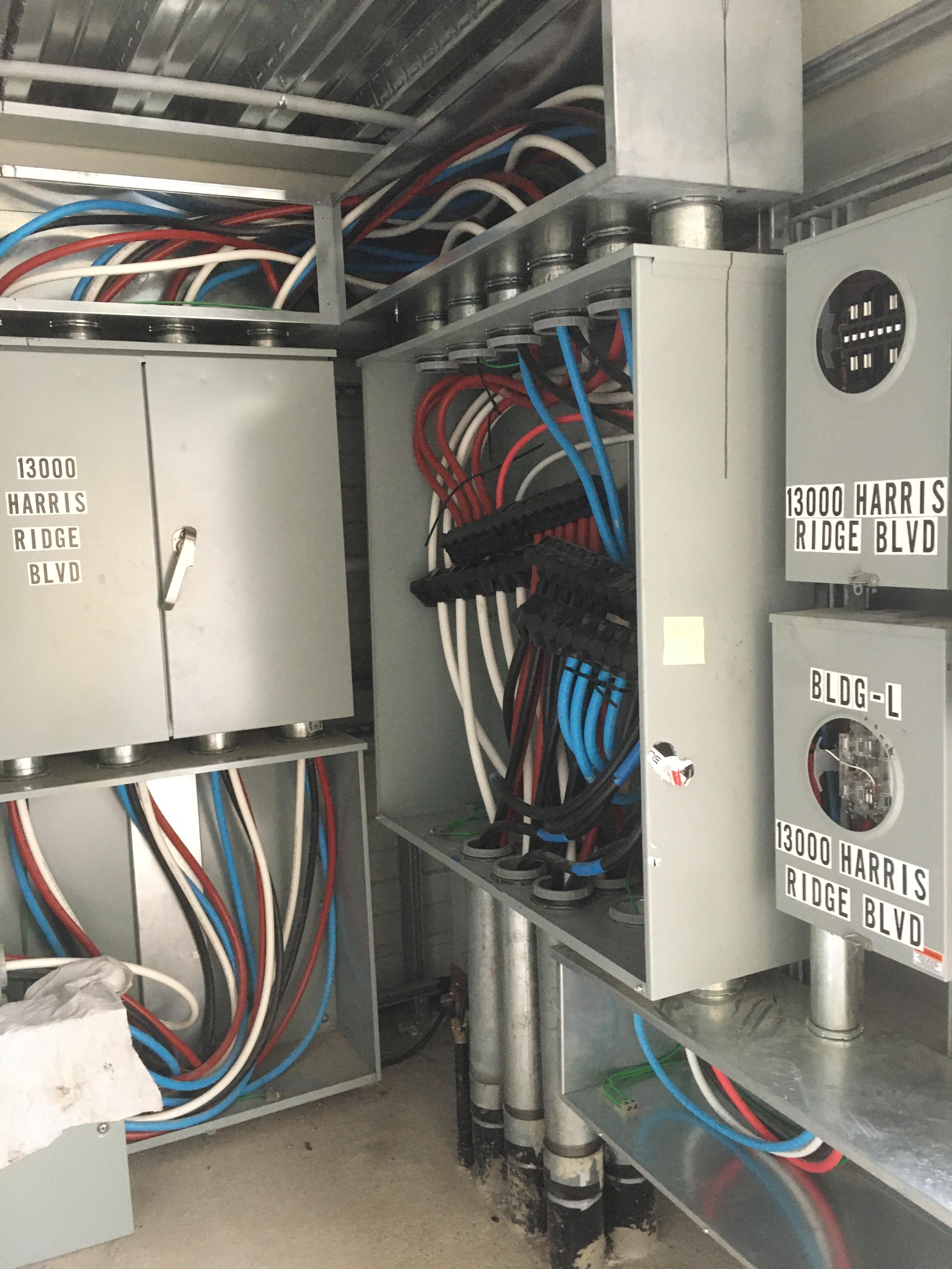 Commercial switchgear room with multiple electrical panels at 13000 Harris Ridge Blvd Austin TX